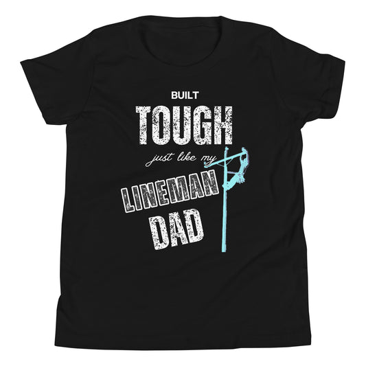 Black t-shirt for kids with white writing that says built tough just like my lineman dad and image of a lineman on a power pole