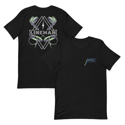 Black lineman shirt with graphic of climbers and gaffs, lightning bolt, and bold lineman text. ARC Apparel logo on front