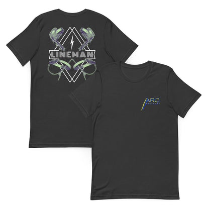 Grey lineman shirt with graphic of climbers and gaffs, lightning bolt, and bold lineman text. ARC Apparel logo on front